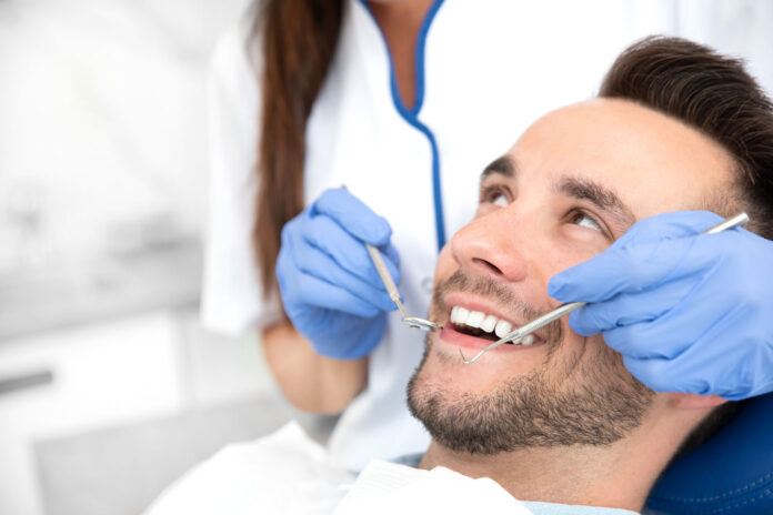 Man-Dental-Exam-6090f216